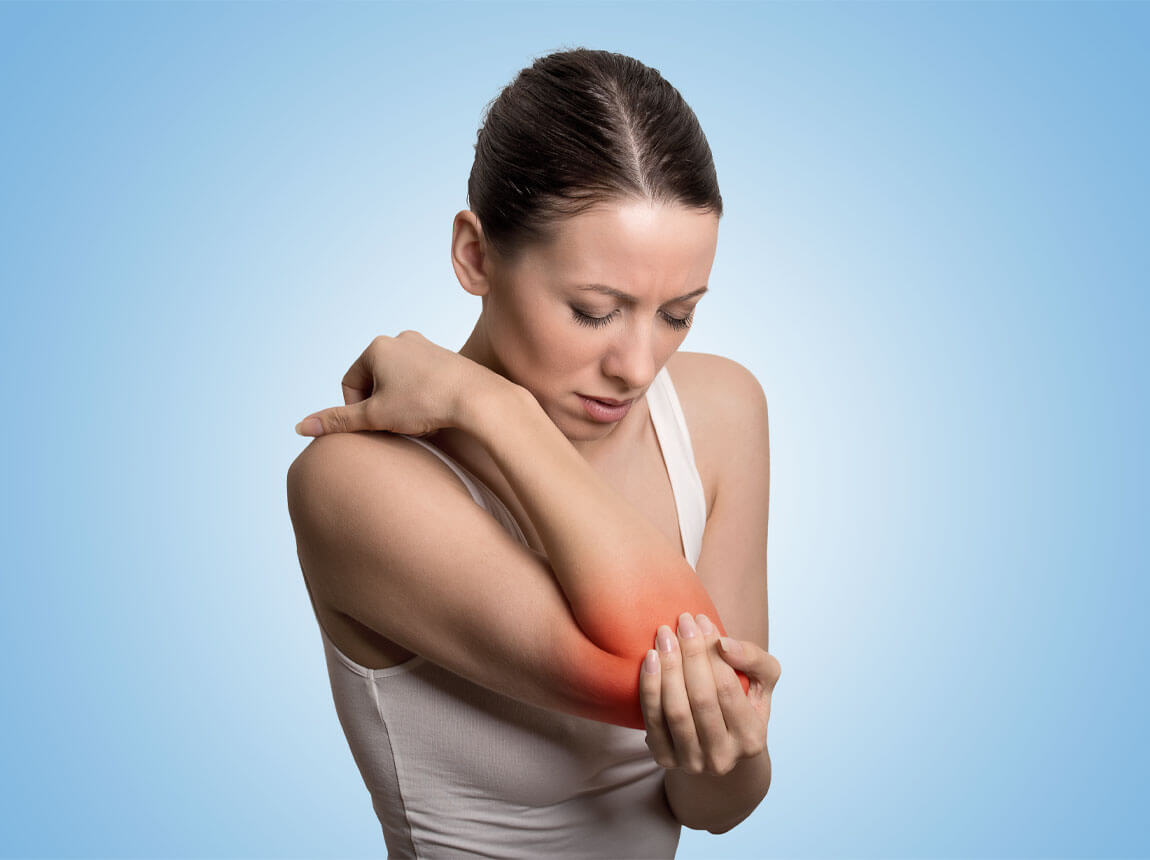 nő - könyökfájdalom 