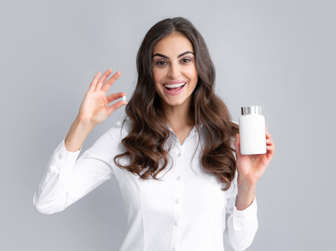 nő magnéziumkapszulákkal