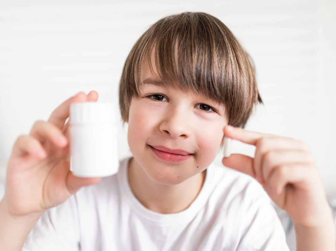 gyermek vaskapszulával